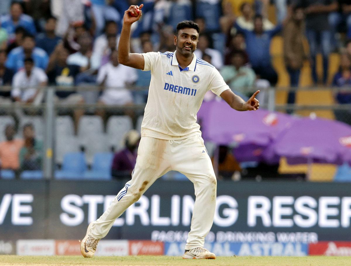  Ravichandran Ashwin celebrates the wicket of Will Young.