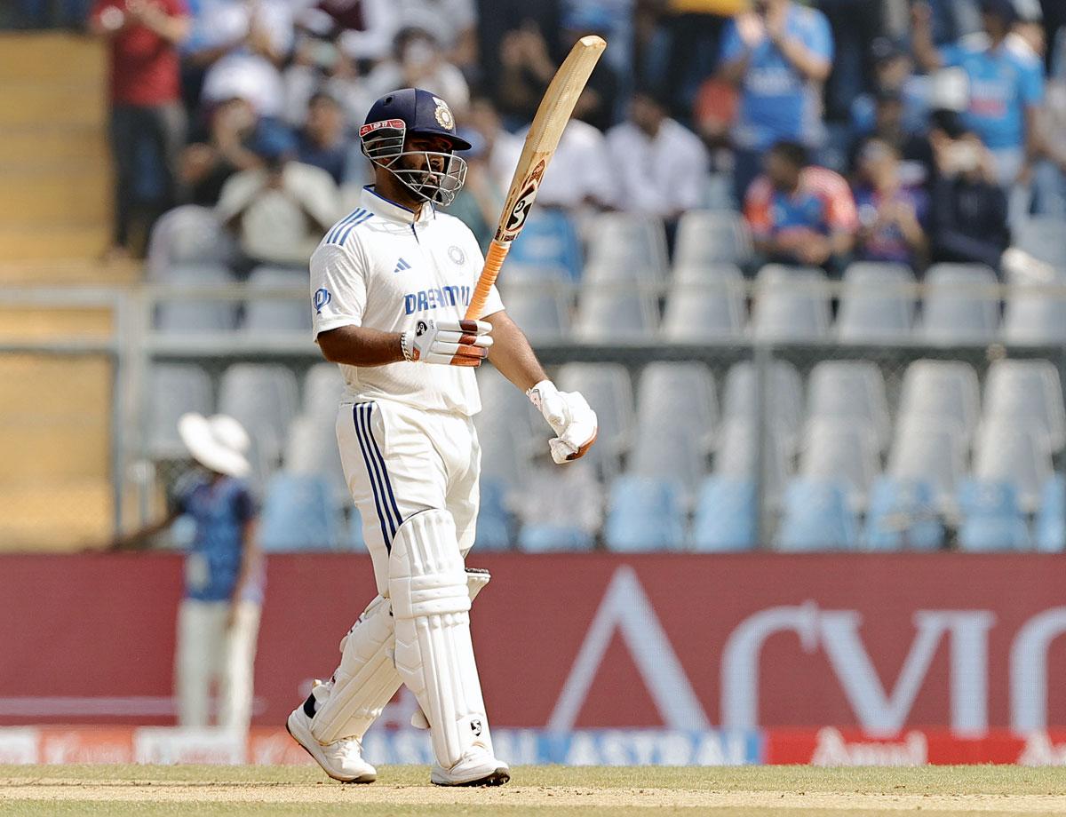 Rishabh Pant celebrates his half-century.