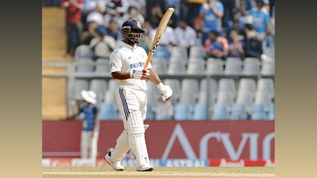 Rishabh Pant celebrates his half-century.