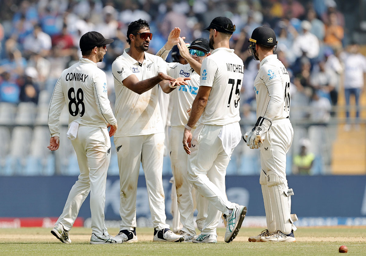 New Zealand's players celebrate after Ish Sodhi got the wicket of Rishabh Pant.