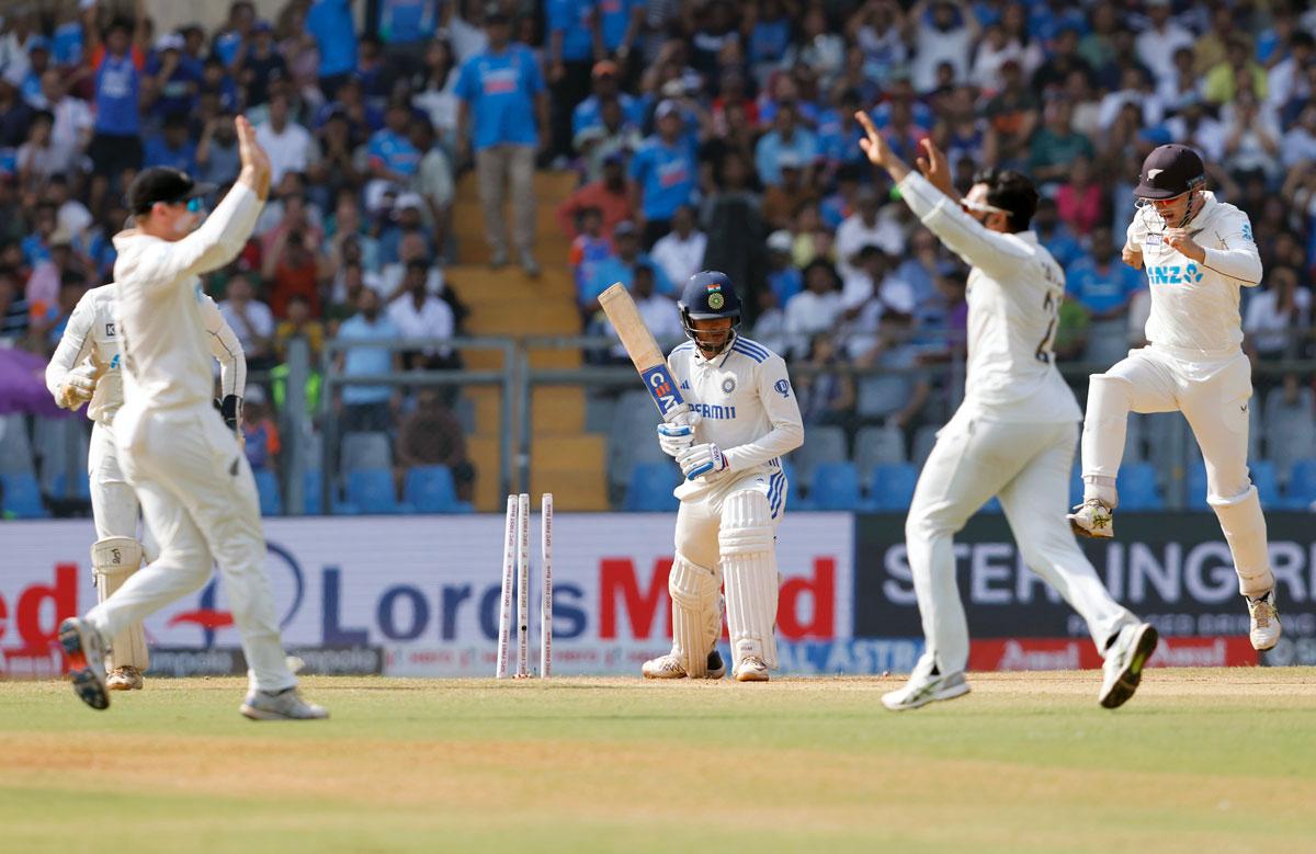 Ajaz Patel celebrates the wicket of Shubman Gill