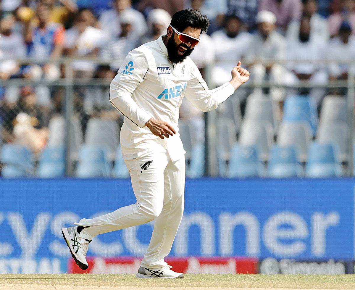 Ajaz Patel celebrates after dismissing Virat Kohli.