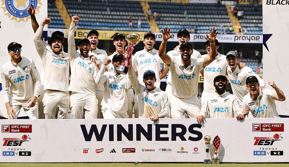 New Zealand players celebrate winning the series