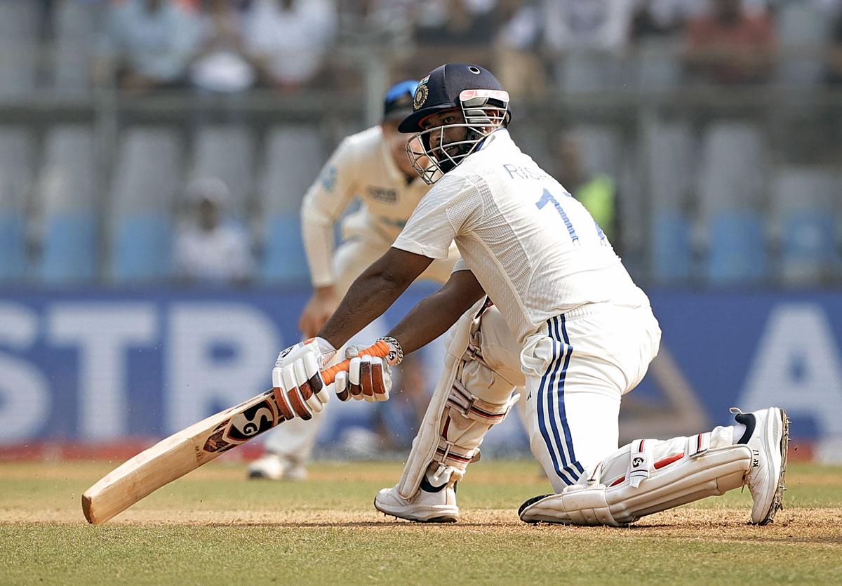 Rishabh Pant plays the reverse sweep.