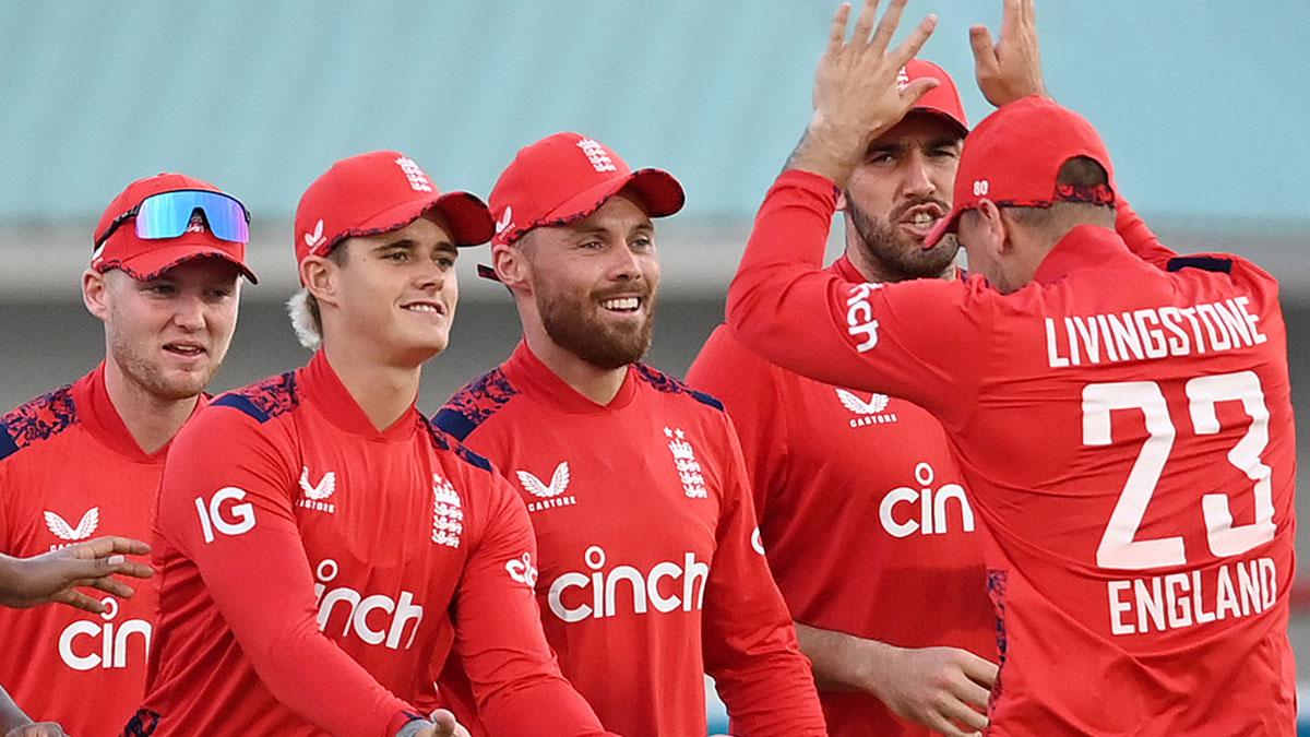 England's players celebrate a wicket