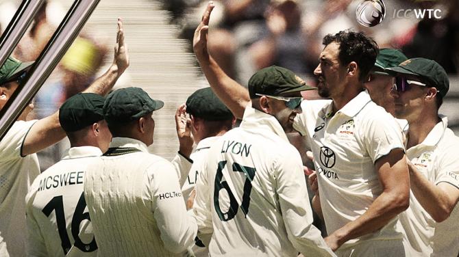 Australia pacer Mitchell Starc celebrates with teammates after dismissing India opener Yashasvi Jaiswal during Day 1 of the first Test in Perth on Friday.