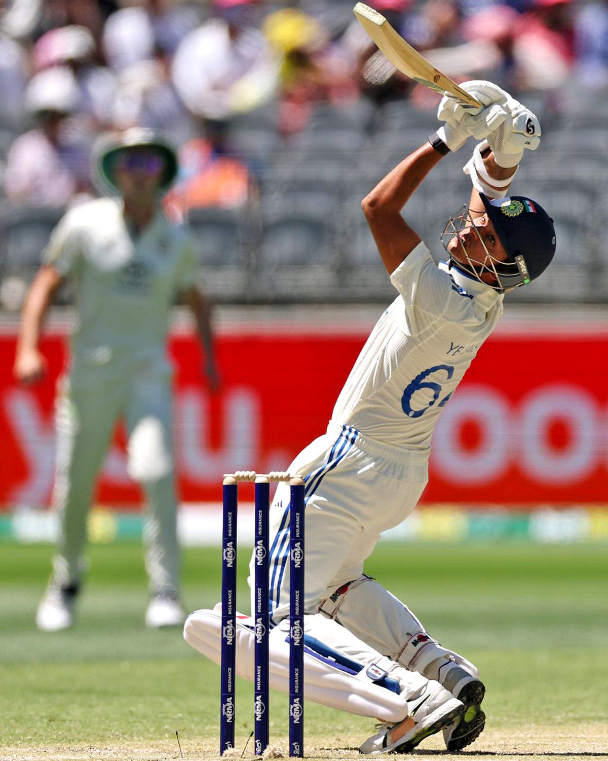 Yashasvi Jaiswal ramps the ball to fine leg for a six to bring up his ton