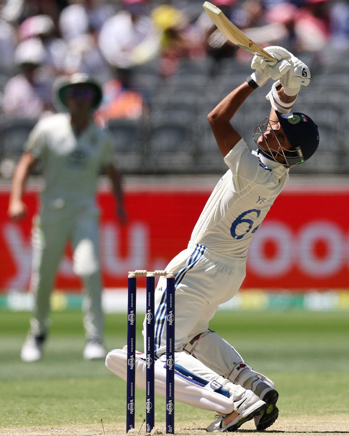 Yashasvi Jaiswal plays the ramp shot for a six to complete his century.