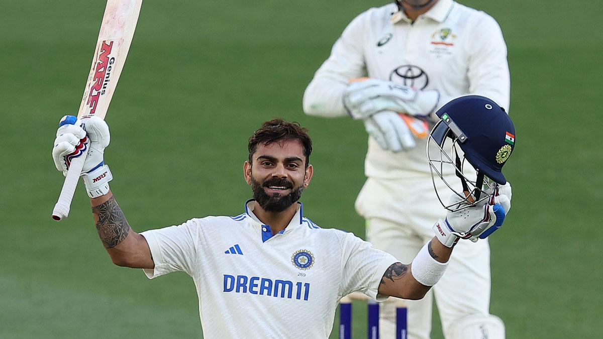 Virat Kohli celebrates his century. 