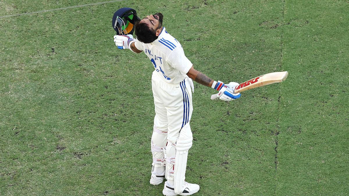 Virat Kohli celebrates his century.