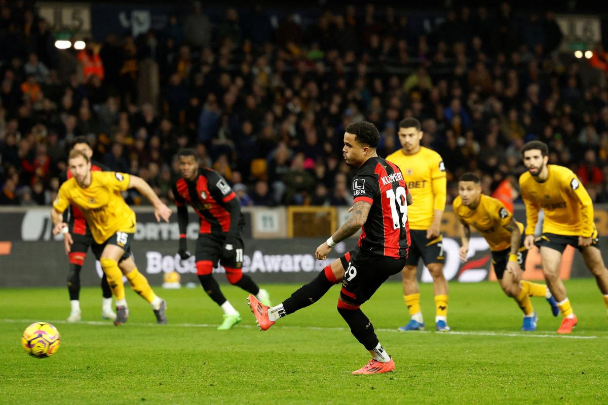 AFC Bournemouth's Justin Kluivert scores their fourth goal from the penalty spot and completes his hat-trick against Wolverhampton Wanderers at  Molineux Stadium, Wolverhampton,  on Saturday 