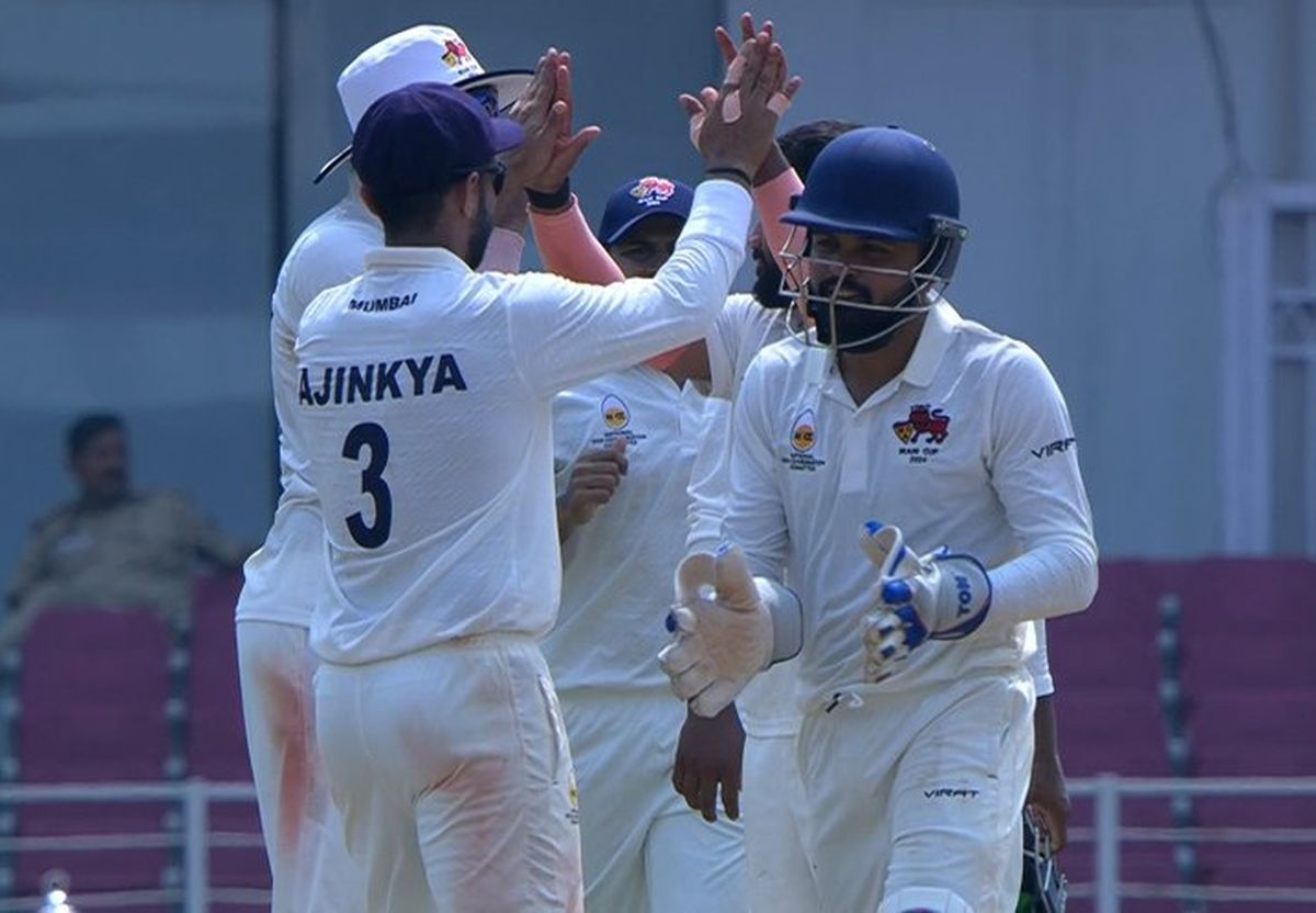 Mumbai's players celebrate a wicket