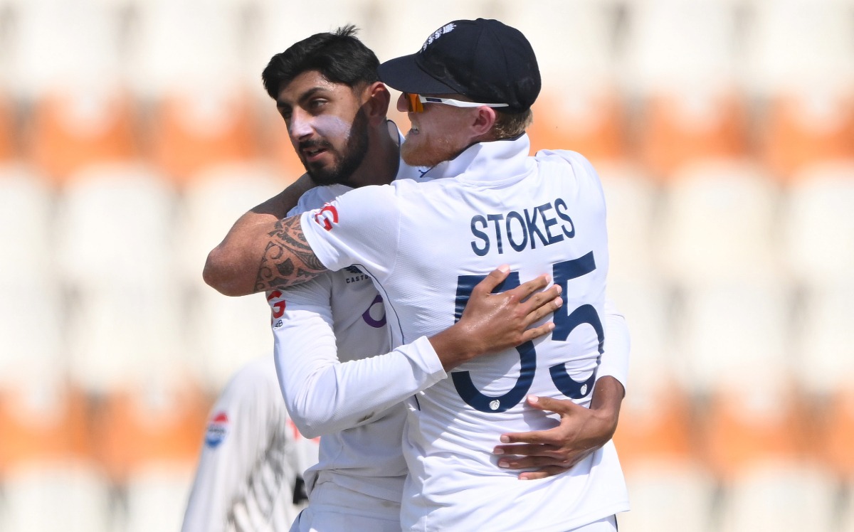 Shoaib Bashir celebrates with Ben Stokes after dismissing Saim