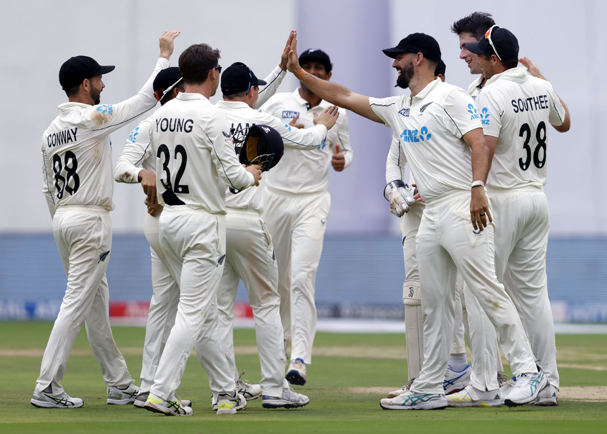 New Zealand's players celebrate the wicket of Yashasvi Jaiswal off the bowling of William O'Rourke.