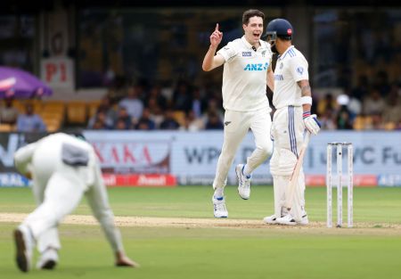 Will O'Rourke celebrates the wicket Virat Kohli, who was caught by Glenn Phillips.