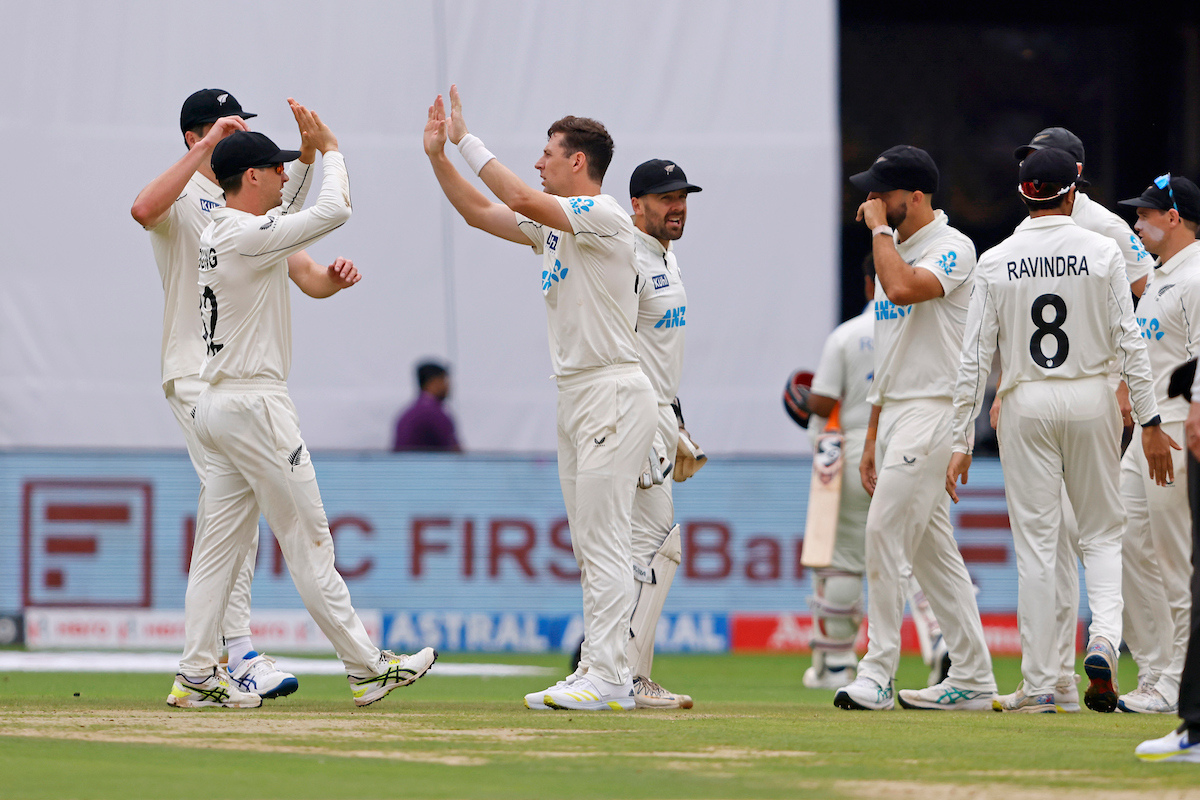 New Zealand players celebrates the wicket of Rishabh Pant on Day 2 of the 1st Test Match played at the M.Chinnaswamy Stadium, Bengaluru, on Thursday