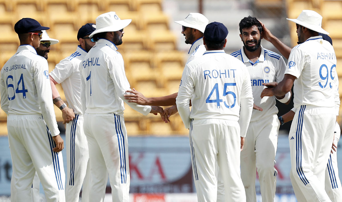 India's players celebrate after Jasprit Bumrah got the wicket of Tom Blundell.