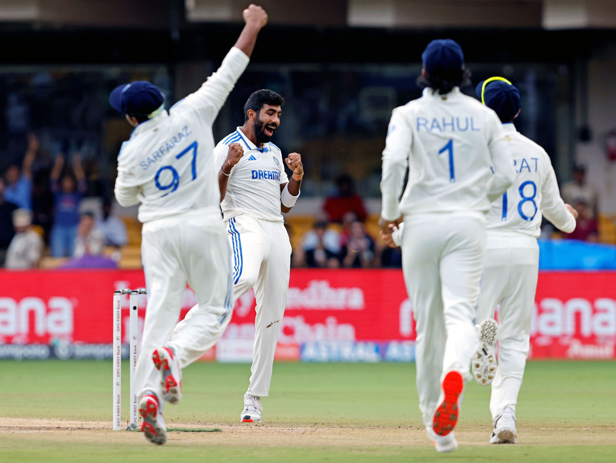 Jasprit Bumrah celebrates the wicket of New Zealand captain Tom Latham.