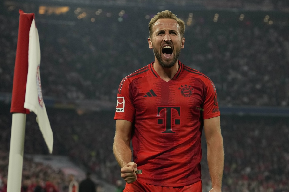 Harry Kane celebrates his second goal against Stuttgart in the Bundesliga on Saturday 