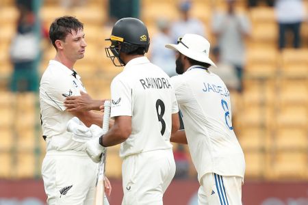 Will Young and Rachin Ravindra are congratulated by Ravindra Jadeja