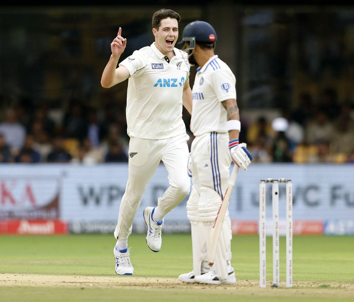 William O'Rourke celebrates the wicket of Virat Kohli