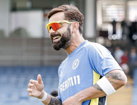 Virat Kohli enjoys himself during the practice session