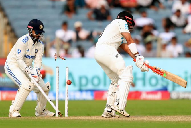 Ajaz Patel is bowled by Washington Sundar