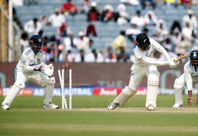 Tom Blundell is bowled by Washington Sundar