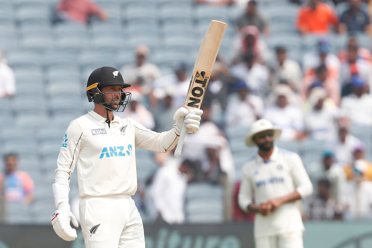 Devon Conway celebrates his fifty