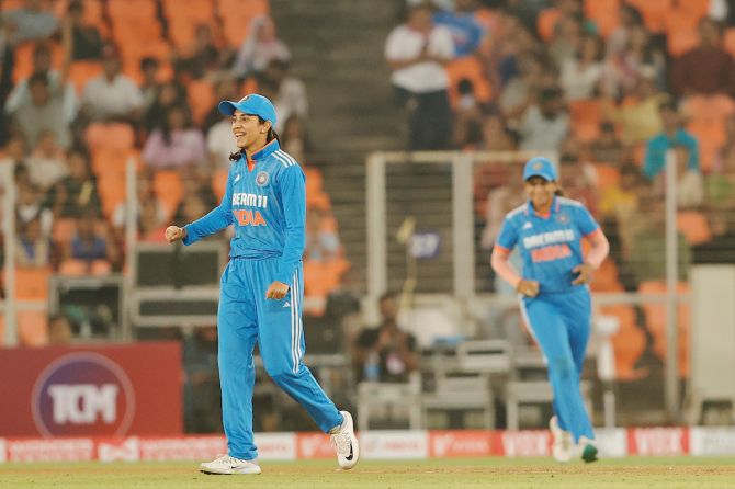 India's captain Smriti Mandhana rejoices after Lauren Down is dismissed during the first ODI against New Zealand in Ahmedabad on Thursday.