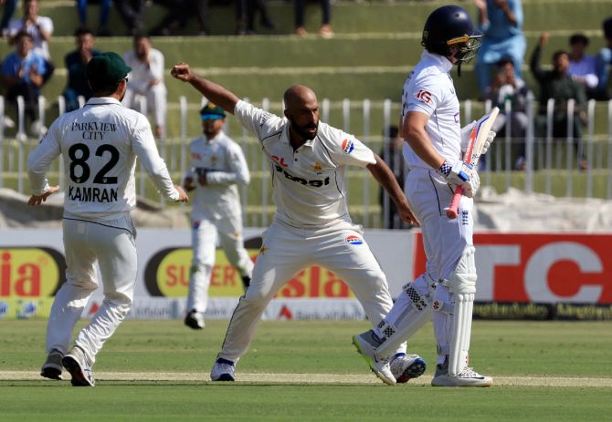  Pakistan's Sajid Khan celebrates