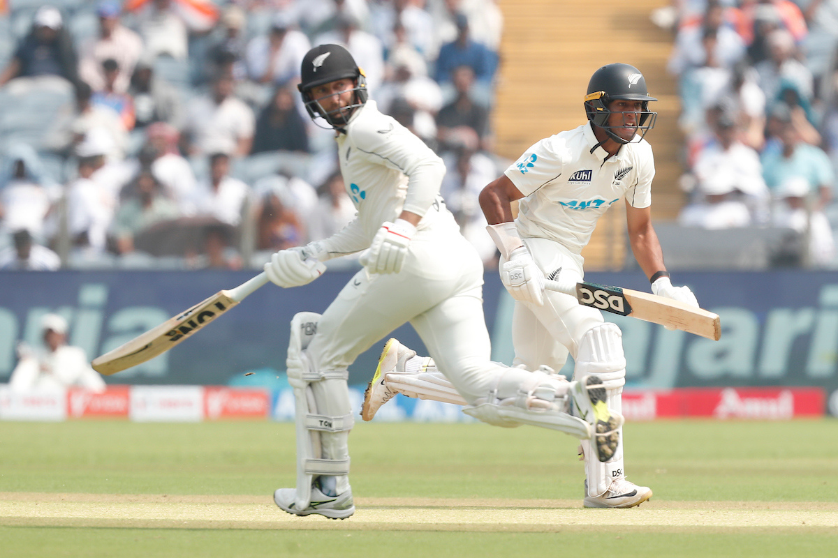 Rachin Ravindra  and Devon Conway   running between the wickets