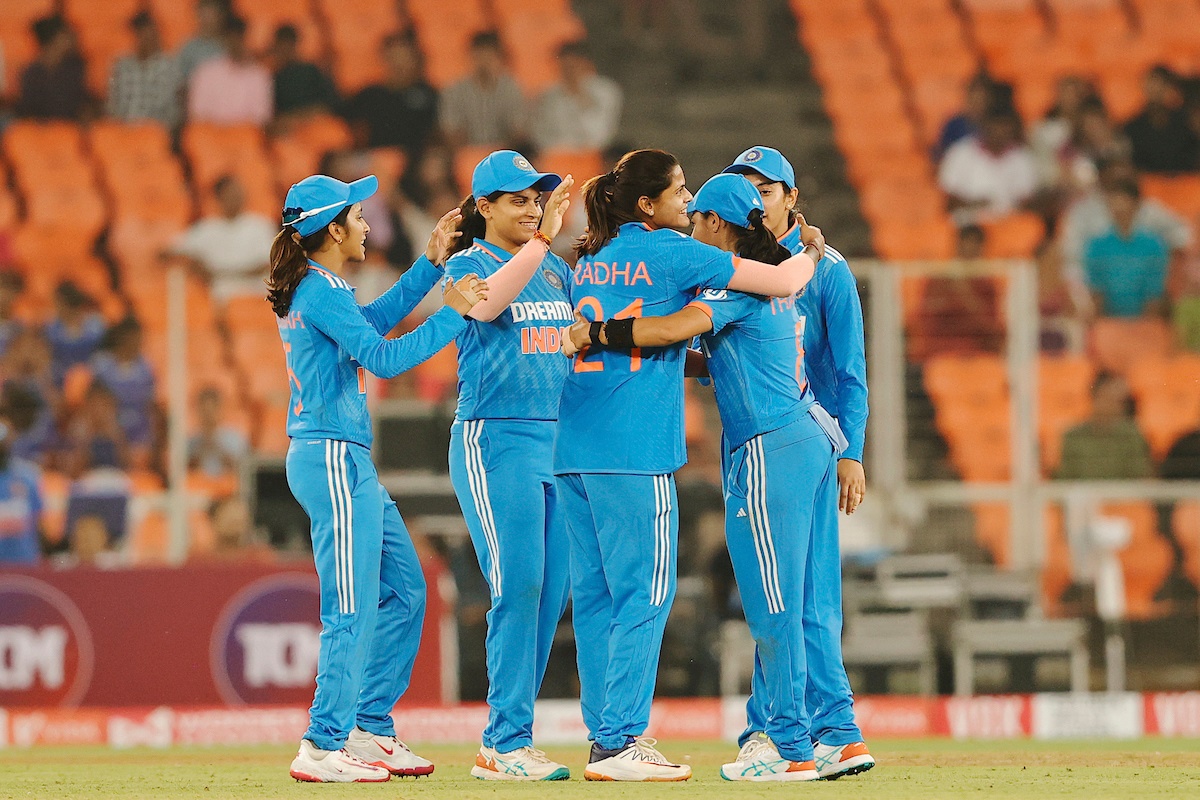 Left-arm spinner Radha Yadav is congratulated by her India teammates after dismissing Jess Kerr during the first ODI against New Zealand at the Narendra Modi stadium, Ahmedabad, on Thursday.