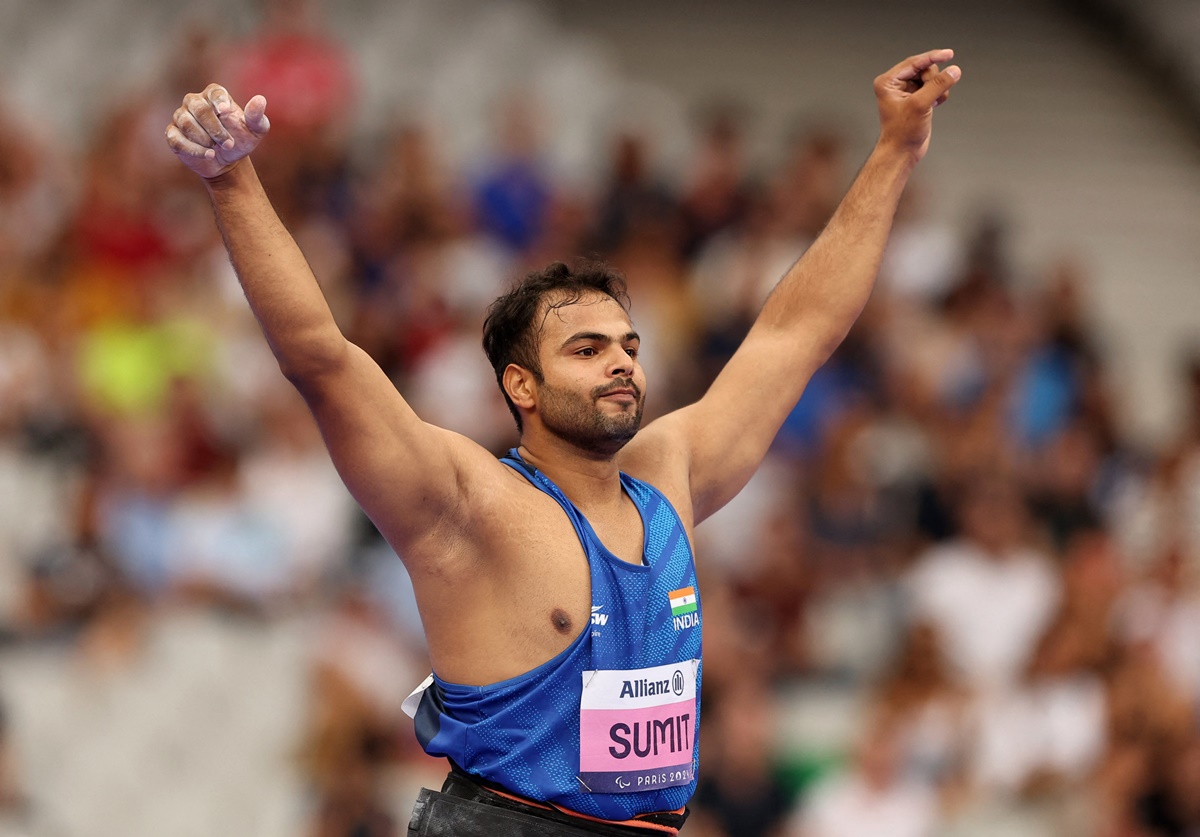 Sumit Antil raises his arms in triumph after clearing 70.59 metres in the men's Javelin Throw at the Paralympics in Paris on Monday.