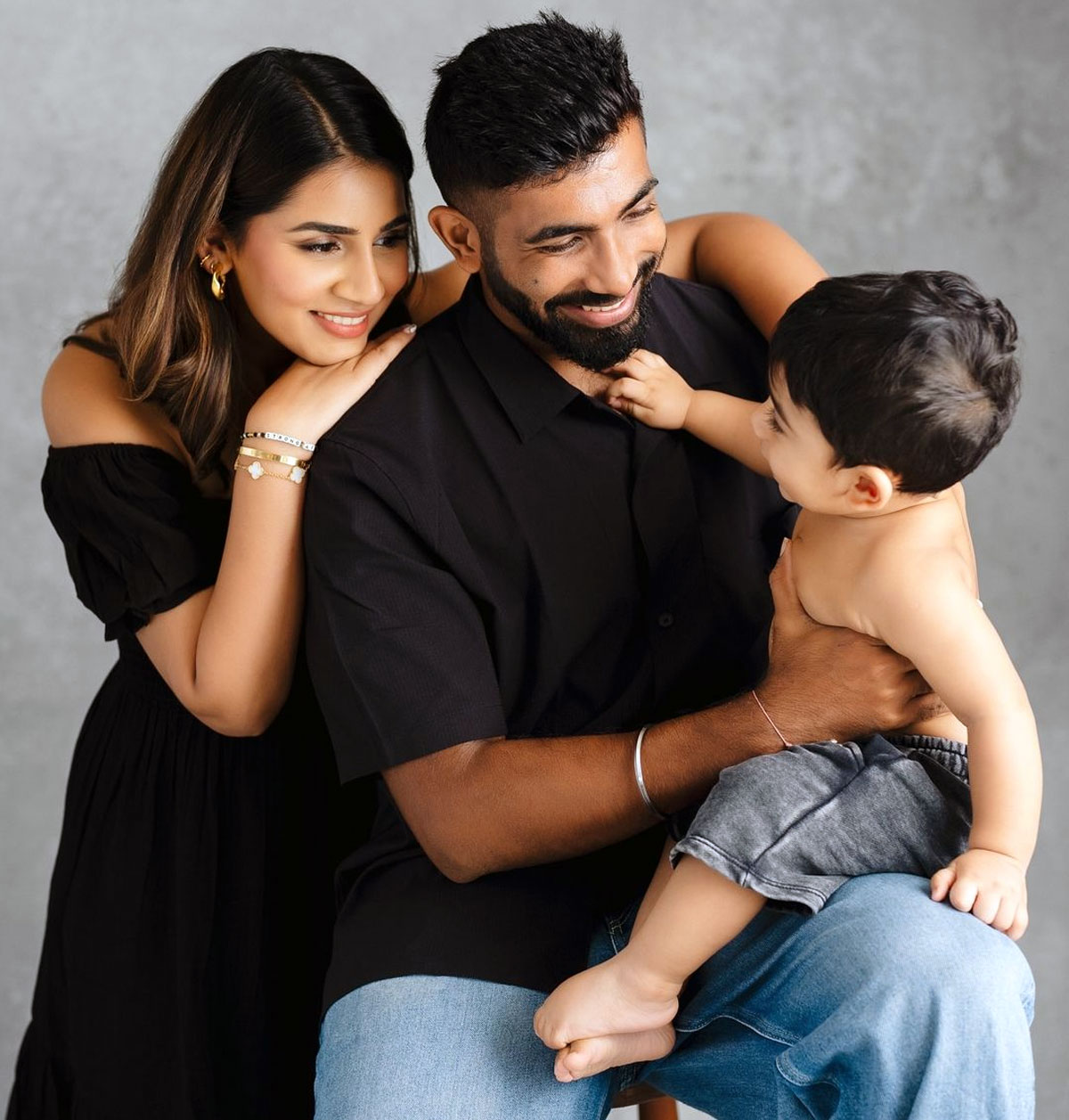 Jasprit Bumrah and Sanjana Ganesan with son Angad