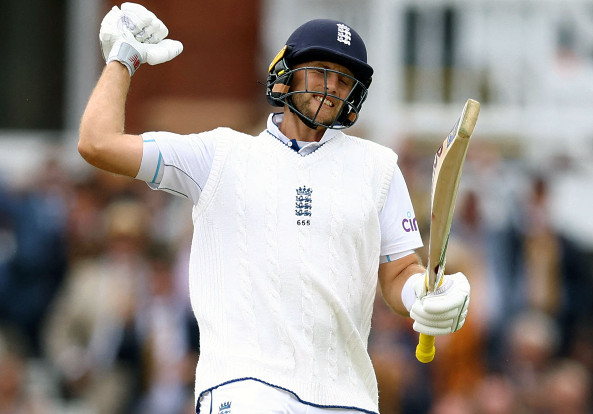 England's Joe Root celebrates after reaching his century