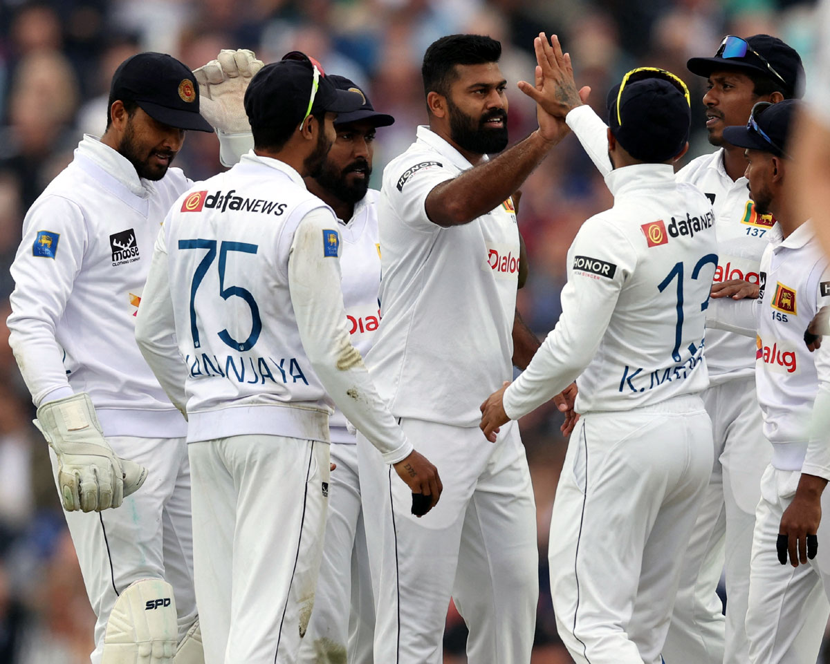 Sri Lanka's players celebrate after Lahiru Kumara got the wicket of England's Dan Lawrence