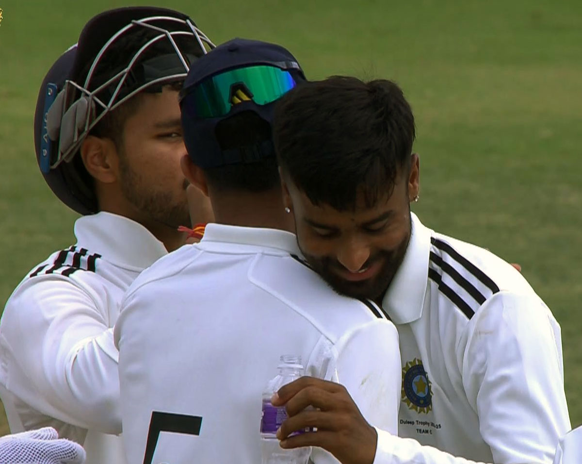 Manav Suthar celebrates a wicket with his India C team-mates