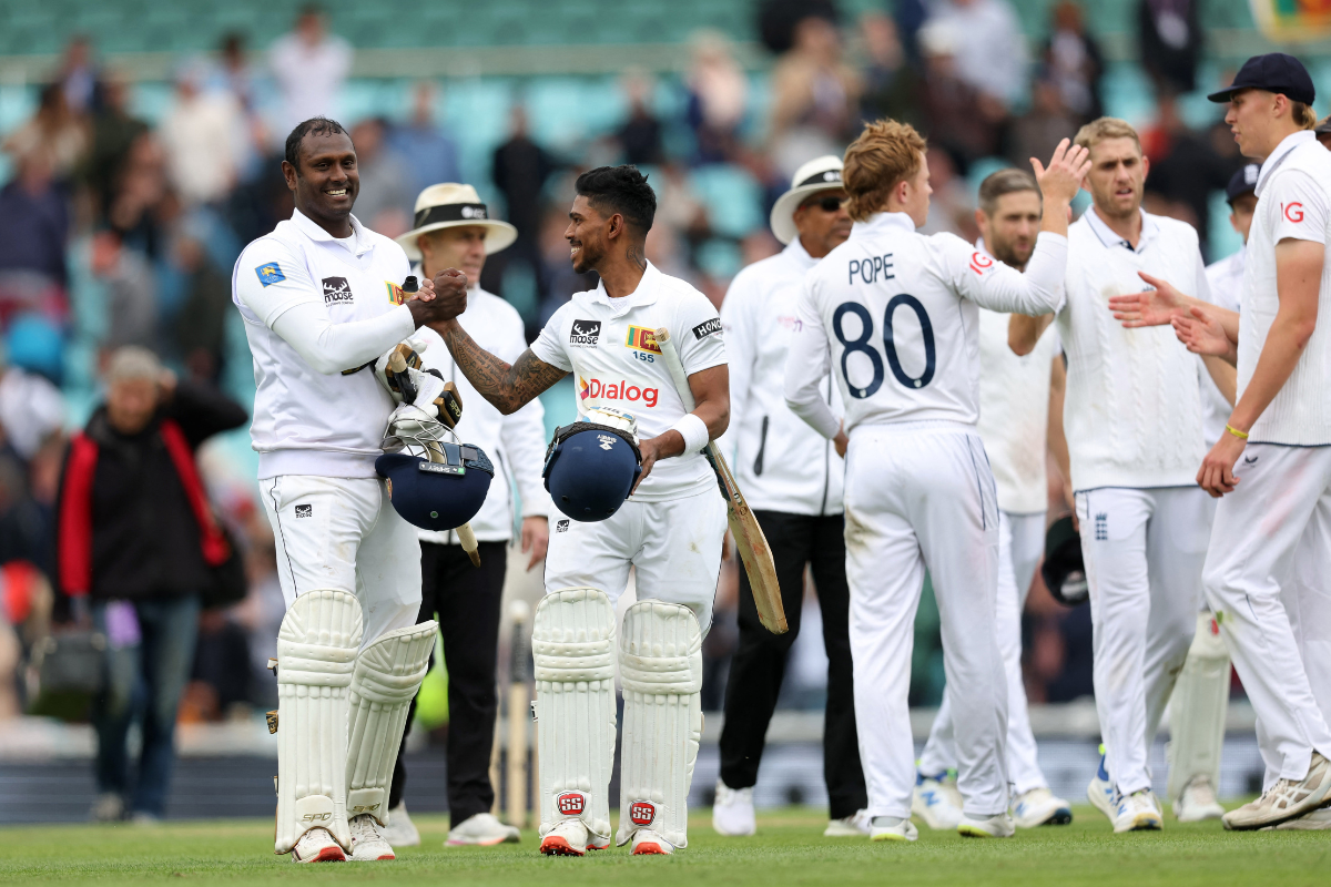 Sri Lanka's Pathum Nissanka celebrates with Angelo Mathews after winning the third Test match against England at The Oval, on Monday. The victory has the Lankans move up to 5th spot in the WTC rankings.