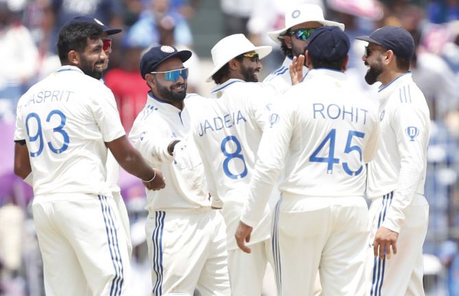 India's players celebrate after Jasprit Bumrah dismissed Mushfiqur Rahim.