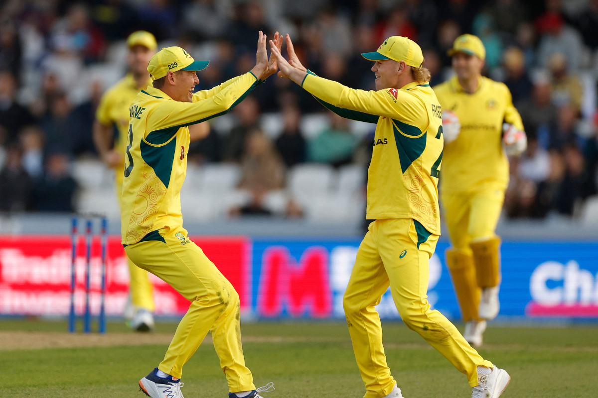 Australia's Jake Fraser-McGurk celebrates with Marnus Labuschagne after catching out England's Jamie Smith, off the bowling of Josh Hazlewood