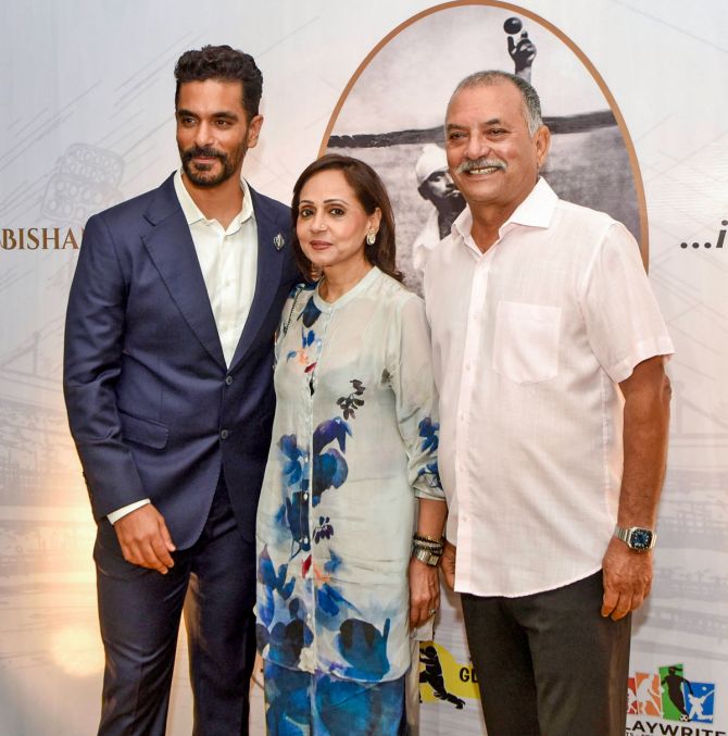 Bollywood actor Angad Bedi with former India cricketer Madan Lal and his wife