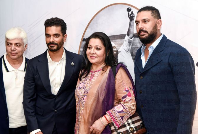 Bollywood actor Angad Bedi with former cricketer Yuvraj Singh and his mother Shabnam Singh during an event honouring Bishan Singh Bedi on his birth anniversary on Wednesday, October 25