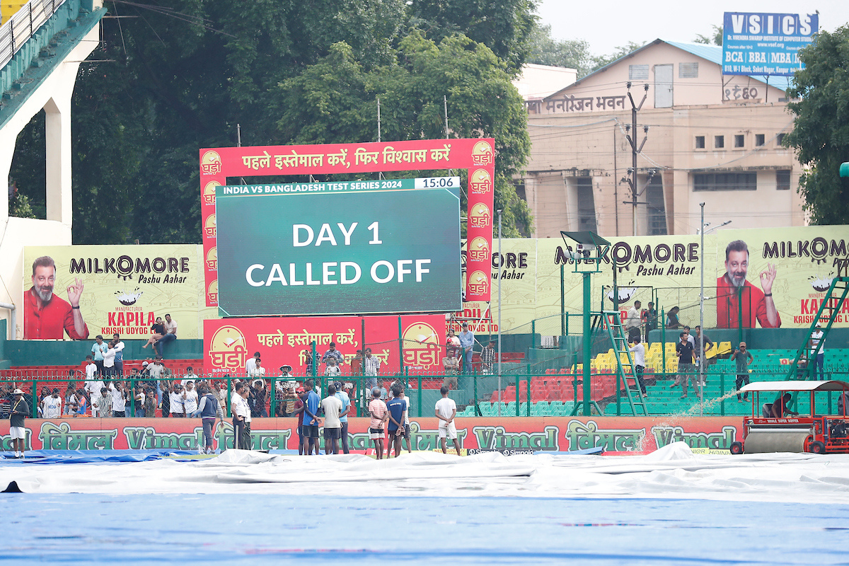 An electronic screen reflects early close of play on Day 1 at the Green Park Stadium in Kanpur