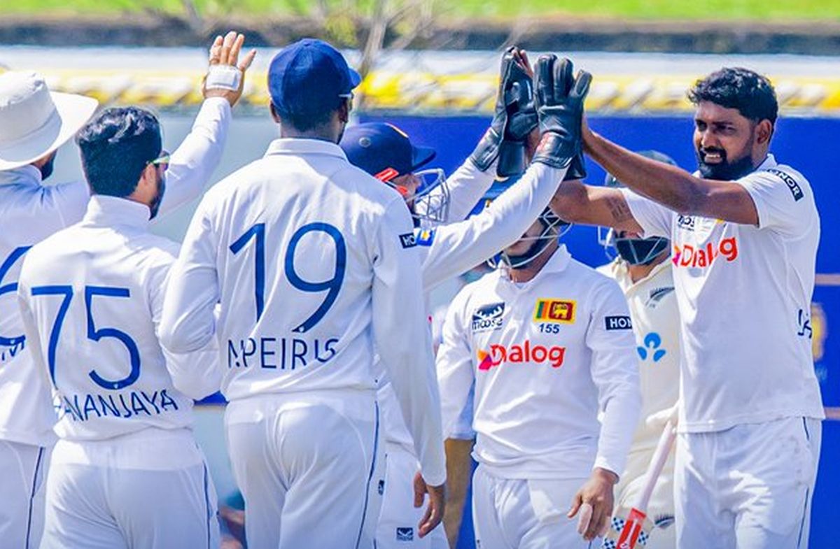 Sri Lanka's players celebrate a wicket.