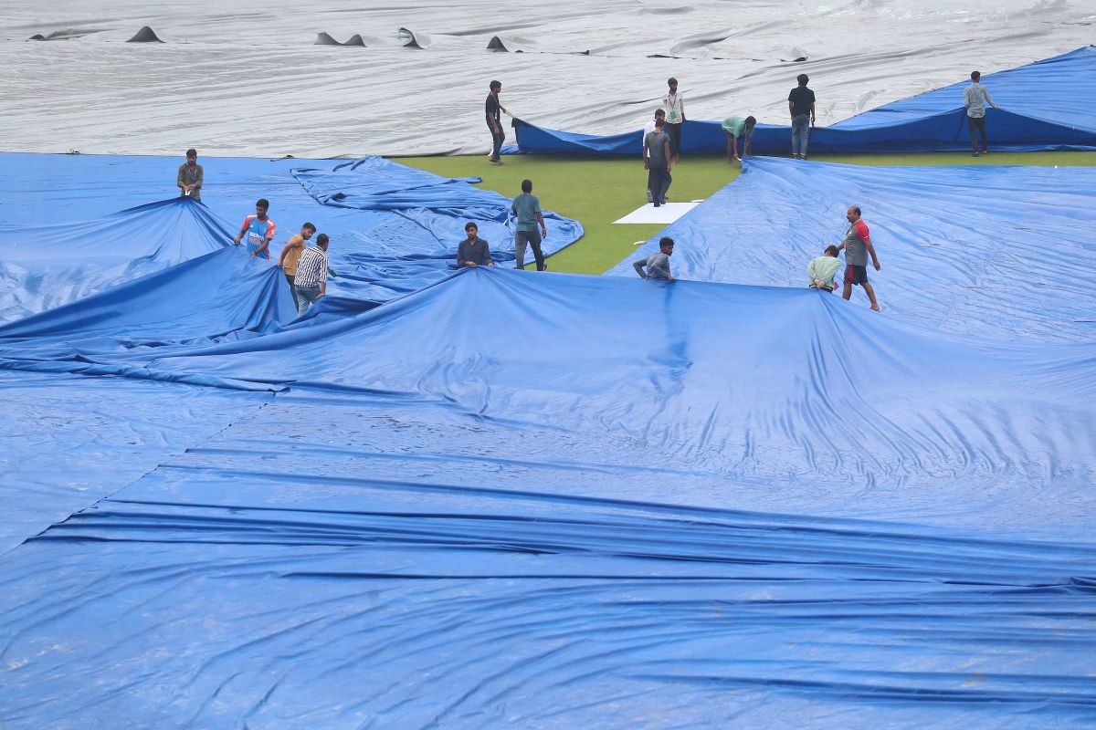 The Green Park Stadium under covers because of rain.