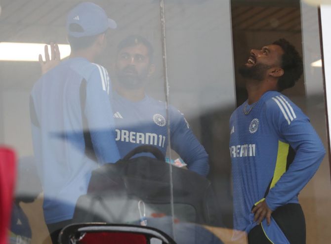 India's players in the dressing room after rain delayed start on Day 2 in Kanpur