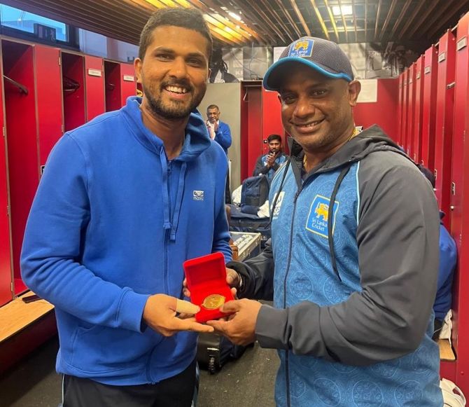 Sanath Jayasuriya with Dinesh Chandimal.