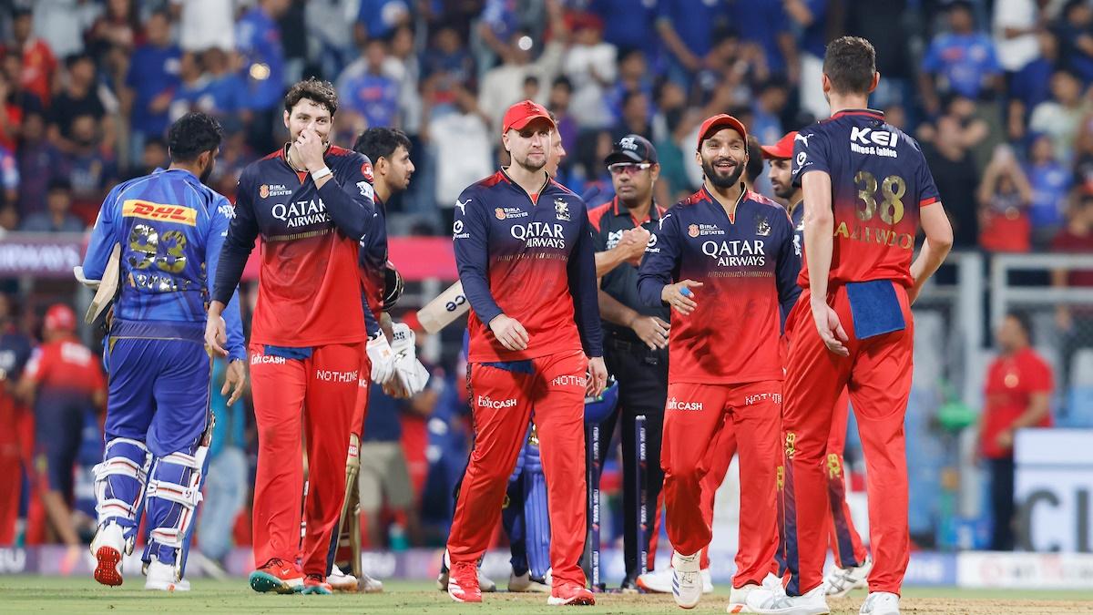 Skipper Rajat Patidar celebrates with his Royal Challengers Bengaluru teammates after a tense victory over Mumbai Indians at the Wankhede stadium, in Mumbai, on Monday. 