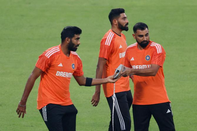 India's Jasprit Bumrah, Mohammed Siraj and Mohammed Shami during practice